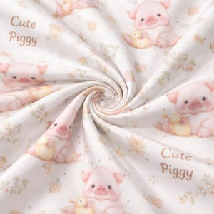 May include: A white ceramic mug with a black handle and the text "But First, Coffee" in a bold, black font. The mug is set against a blurred background, suggesting a cozy setting.