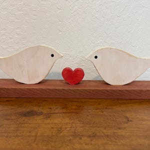 Small love birds. 4” x 14”. Hand made and hand painted. Cute gift for someone you love.