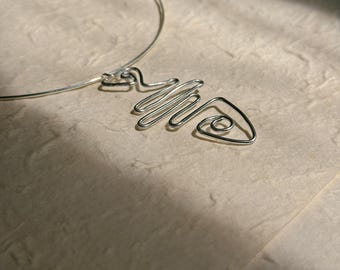 collar necklace with wire fish pendant