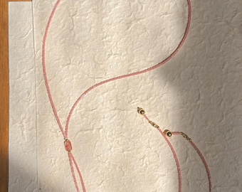 bolo necklace with pink glass seed beads and gold components