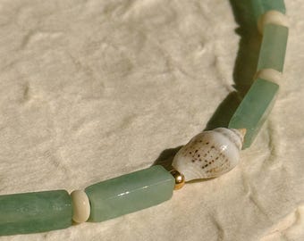 one of a kind beaded necklace made from vintage beads, green aventurine tube beads, a statement shell, and gold components