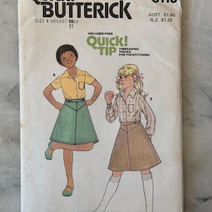 May include: Vintage Butterick sewing pattern for a skirt and top, size 8, with a breast measurement of 69cm. The cover features illustrations of two young people wearing the garments. Includes a quick tip for topstitching.