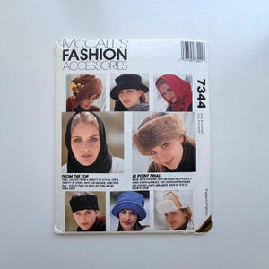 May include: McCall's Fashion Accessories pattern with diverse hat styles. The cover displays images of various hats, including a cloche, a beret, and a fur hat. The pattern fits head sizes 55 to 60 cm.