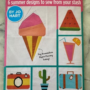 May include: A sewing pattern set titled "FPP PATTERN SET" with six summer designs. The cover features colourful geometric designs of an ice cream cone, watermelon, cocktail, camera, cactus, and suitcase. Includes full-size templates and an instruction book.