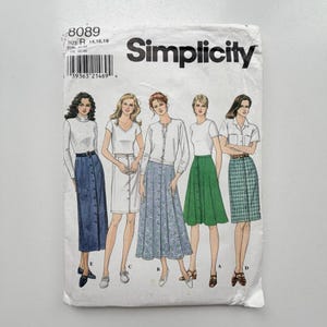 May include: A Simplicity sewing pattern envelope 8089 for sizes 14, 16, 18. The front displays illustrations of five different skirt styles, including button-front designs, a floral print skirt, and a plaid skirt, paired with various tops.