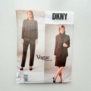 May include: A DKNY Vogue Patterns sewing pattern envelope, number 1982, featuring two illustrations of a suit. One shows a dark blazer with trousers, and the other shows a dark blazer with a skirt. The text includes DKNY, Vogue American Designer, and Vogue Patterns.