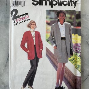 May include: A vintage Simplicity sewing pattern envelope with illustrations of women's suits. The envelope is white with the Simplicity logo and text, including "2 Hour Express Collection". The models are wearing a red blazer and a grey skirt suit.