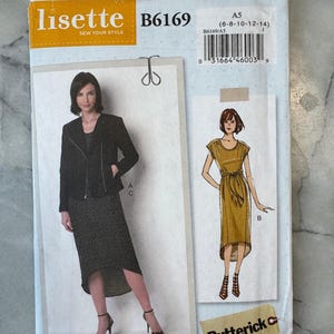 May include: A sewing pattern package featuring illustrations of women's clothing designs. The package includes the "lisette" logo, pattern number B6169, and a Butterick logo. The designs include a jacket and dress.