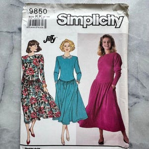 May include: A vintage Simplicity sewing pattern, number 9850, with illustrations of three dress designs. The pattern includes the text "Jiffy" and "OVERLOCK SERGER". The dresses are in floral, teal, and magenta colours.