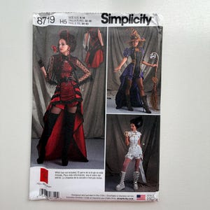 Peut inclure: Patron de couture Simplicity 8719 avec trois modèles de costumes d'Halloween : une sorcière, un vampire et une mariée de Frankenstein. Le patron est disponible pour les tailles US 6-14, soit les tailles européennes 32-40 et françaises 34-42.