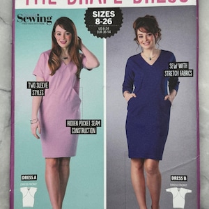 May include: A sewing pattern titled "The Drape Dress" featuring two dress styles. The pattern includes sizes 8-26 (US 6-24, EUR 36-54). The cover shows two women modeling the dresses, highlighting features like hidden pockets and flattering length.