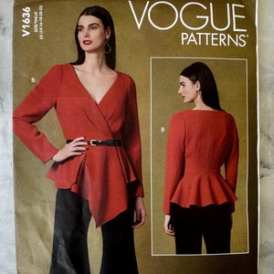 May include: Vogue Patterns sewing pattern V1636. The pattern features a red wrap top with a peplum and long sleeves, paired with black pants. The pattern envelope has the Vogue Patterns logo and the size range.