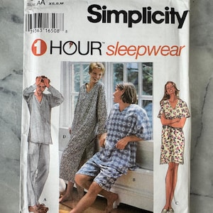 May include: A Simplicity sewing pattern for sleepwear, with illustrations of different pajama styles. The pattern includes the text "1 HOUR sleepwear" and size details. The cover is white with a blue barcode.