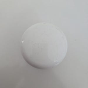 May include: A solid white, circular cabinet knob with a smooth, glossy finish. The knob features a simple, rounded dome shape that is uniform in colour and texture, providing a clean and neutral appearance for furniture or cabinetry hardware.