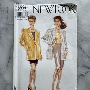 May include: A vintage New Look sewing pattern featuring illustrations of women in blazers and skirts. The pattern number is 6654, with sizes 8-18. The cover has a worn appearance.
