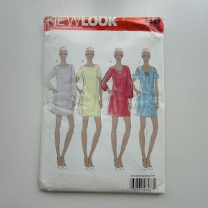 May include: A New Look sewing pattern envelope showing illustrations of four dress designs. The dresses are in light grey, yellow, red, and light blue. The envelope has the text "NEW LOOK" at the top.
