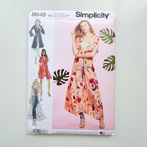May include: Simplicity sewing pattern 8648, size H5, for a long duster or robe with various sleeve and length options. The envelope features illustrations of four garment variations, including a peach floral print duster and blue patterned coat.