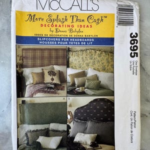 May include: A McCall's pattern envelope featuring "More Splash Than Cash" decorating ideas by Donna Babylon. The cover displays images of slipcovers for headboards, with text in English and French. The pattern number is 3695.