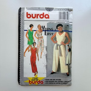 May include: A vintage Burda sewing pattern for a jumpsuit. The pattern features illustrations of different jumpsuit styles in green, red, and patterned fabrics. The text "Young & Easy" is prominently displayed, along with the Burda logo.