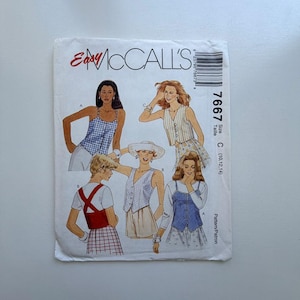 May include: A vintage Easy McCall's sewing pattern, showing illustrations of women's tops, vests, and skirts. The white envelope has the brand name in red and black. The size is C (10, 12, 14).