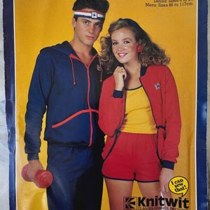 May include: Vintage pattern for unisex techno sports clothing. The pattern includes sizes for both ladies and men. The image shows a man and woman wearing the outfits. The outfits include a blue zip-up jacket and pants, and a red jacket and shorts.