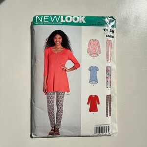 May include: A New Look sewing pattern package featuring a woman modeling a coral tunic and patterned leggings. The package includes illustrations of various knit tops and leggings. The text "easy just for KNITS" is visible.