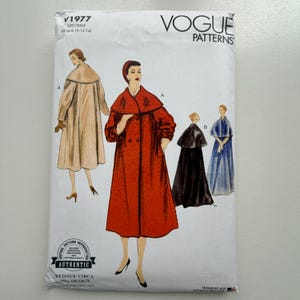 May include: Vogue Patterns sewing pattern V1977. The pattern features illustrations of women's coats and capes. The pattern includes sizes 6-14. The pattern is a reissue of a 1955 design.
