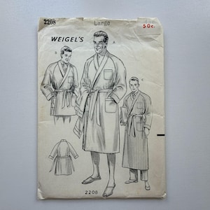 May include: Vintage Weigel's sewing pattern for a large-sized robe. The pattern features illustrations of the robe design, including a belted closure and pockets. The pattern is printed on aged paper with the number 2208 and the price 50c.
