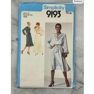 May include: Vintage Simplicity sewing pattern 9193, size 12, featuring illustrations of three dress designs. The pattern envelope is blue with white text and a price tag. Bust measurement is 87 cm.