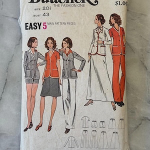 May include: Vintage Butterick sewing pattern 6621, with illustrations of women's fashion designs. The pattern includes options for a skirt, trousers, shorts, and tops. The package is white with text and illustrations.