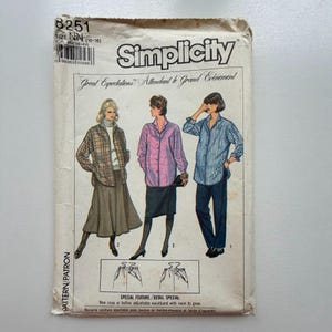 May include: Vintage Simplicity sewing pattern 8251. The pattern features illustrations of three different outfits, including a skirt, shirt, and trousers. The text on the pattern reads "Great Expectations! Attendant le Grand Evénement."