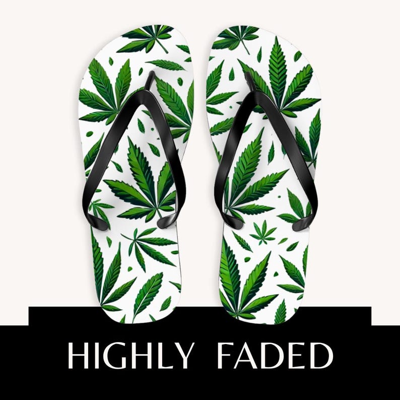 May include: A pair of flip-flops featuring a white base with a repeating green cannabis leaf pattern and black straps. Below the footwear, a black rectangular graphic contains the white text HIGHLY FADED in a clean, sans-serif font.