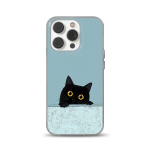 May include: A clear phone case featuring a black cat peeking over a light blue surface. The cat has yellow eyes and is set against a solid light blue background. The phone case has a camera cutout.