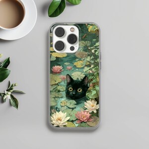 May include: A smartphone case featuring a graphic illustration of a black cat with yellow eyes peeking out from a pond filled with green lily pads and blooming white and pink water lilies, with a camera cutout at the top left corner.