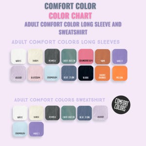 May include: A color chart for adult Comfort Color long sleeve shirts and sweatshirts. The chart displays a variety of colors, including white, ivory, pepper, light green, and black. The text "Comfort Color" is at the top.
