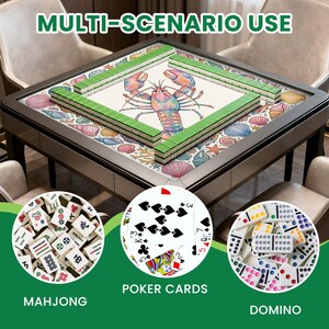 May include: A square mahjong table with green tiles and a seashell design. The table is surrounded by chairs. The image also shows mahjong tiles, poker cards, and dominoes. Text on the image reads "MULTI-SCENARIO USE", "MAHJONG", "POKER CARDS", and "DOMINO".