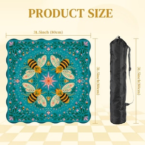 May include: A square teal mat with a bee and floral design, measuring 31.5 inches (80cm) on each side. The mat is accompanied by a black carrying bag. The words "PRODUCT SIZE" are at the top.