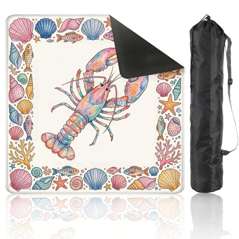 May include: A yoga mat with a watercolour lobster design. The mat is bordered with seashells, starfish, and fish. A black carrying bag is included. The mat is designed for yoga and fitness.