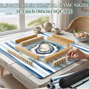 May include: A square Mahjong game mat, 31.5 inches (80cm), with a blue and white striped design. The mat features a coastal theme with an oyster shell design in the center. The image includes Mahjong tiles, a teapot, and teacups.