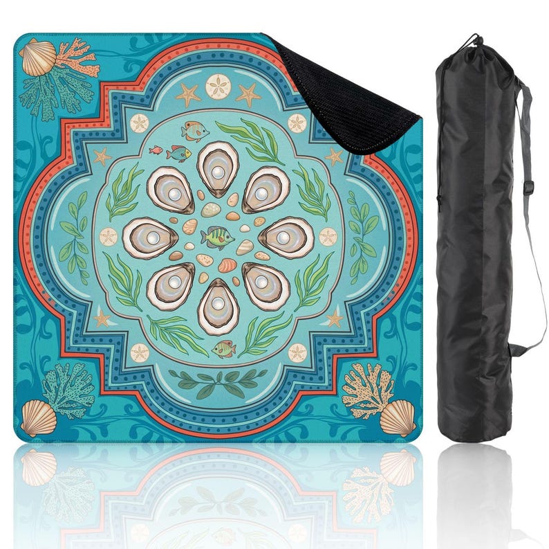 May include: A square yoga mat with a sea-themed design featuring oysters, seashells, and fish in shades of teal, blue, and orange. The mat is accompanied by a black carrying bag with a drawstring closure.