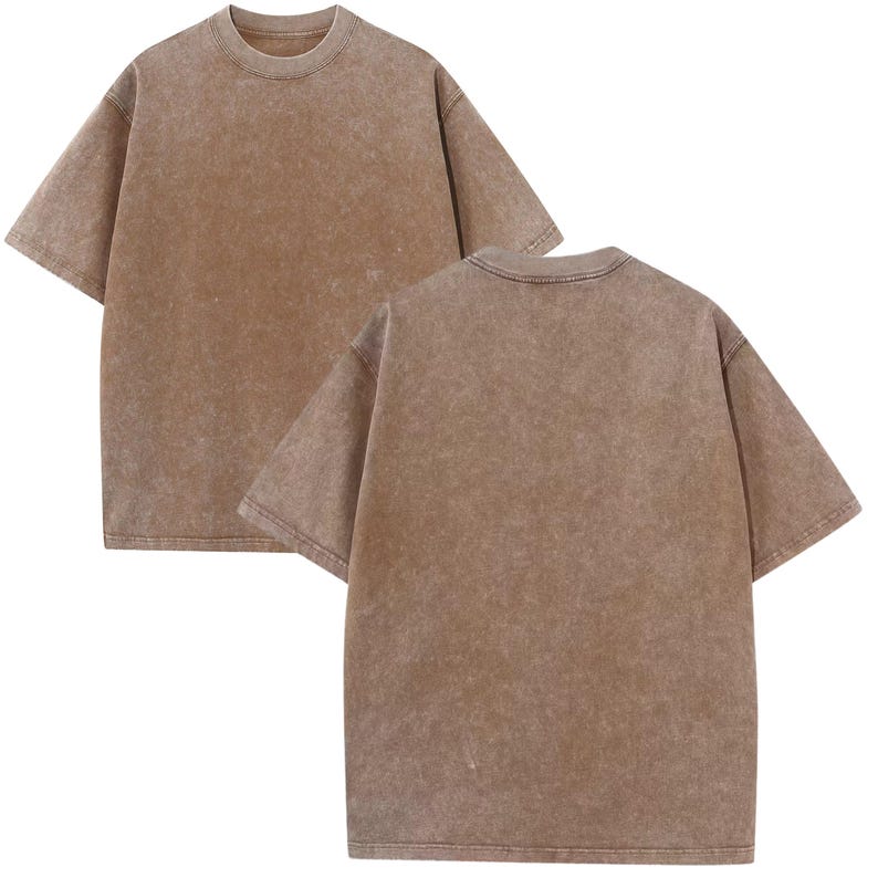 two identical light brown t-shirts, one facing the camera and the other facing away.