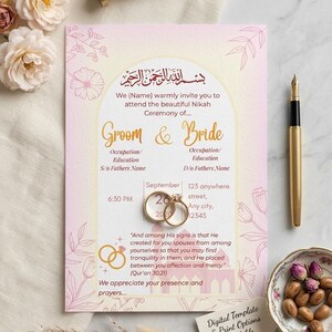 May include: A wedding invitation with a pink and gold design. The invitation includes the words "Groom & Bride" and details for the ceremony. Gold rings are featured, along with a gold pen and a decorative stamp.