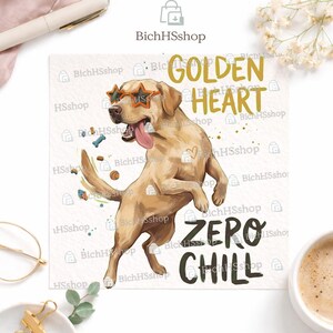 May include: A square print featuring a cartoon Labrador Retriever wearing star-shaped sunglasses. The dog is jumping with its tongue out, surrounded by playful elements. Text reads "GOLDEN HEART ZERO CHILL".