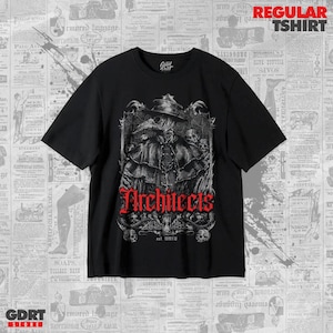 May include: A black short-sleeve t-shirt featuring a graphic print of a plague doctor wearing a wide-brimmed hat and a long coat. The word Architects is printed in red gothic lettering below the figure, surrounded by skulls and ornate details.