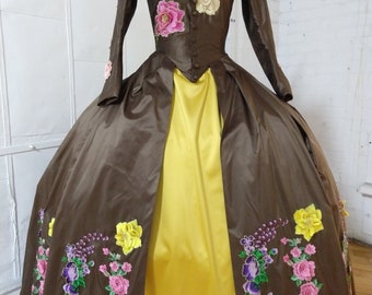Brown silk dress with heavy floral decoration