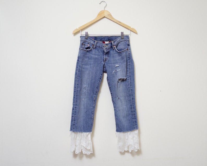 distressed designer jeans