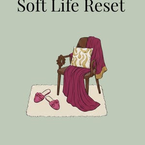 May include: Illustration of a cozy scene with a wooden chair, a burgundy blanket, and a decorative pillow. The image includes a pair of pink slippers and a rug. Text at the top reads "Soft Life Reset" and at the bottom "an adult coloring book for stress relief and self care."