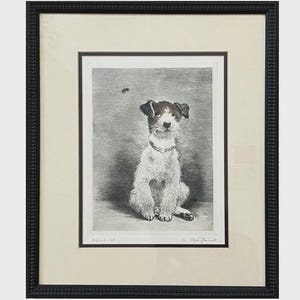 May include: Black framed print of a dog with a fly above its head. The dog is white with brown markings and is wearing a collar. The print is in a black frame with a textured border and a cream-colored mat.