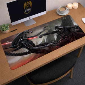 May include: A rectangular mousepad featuring a battle scene between Darth Vader and an Alien creature, with red lightsabers. The background shows a dark, ominous landscape. The mousepad has the text "ZHAI DESIGN STORE" on the top left.