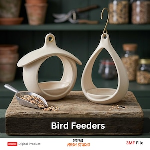 May include: Two cream-colored ceramic bird feeders. One is round with a roof, the other is teardrop-shaped with a brass hook. A metal scoop of birdseed sits on a wooden surface. The text "Bird Feeders" is at the bottom.